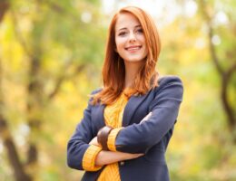 Redhead girl at autumn aoutdoor