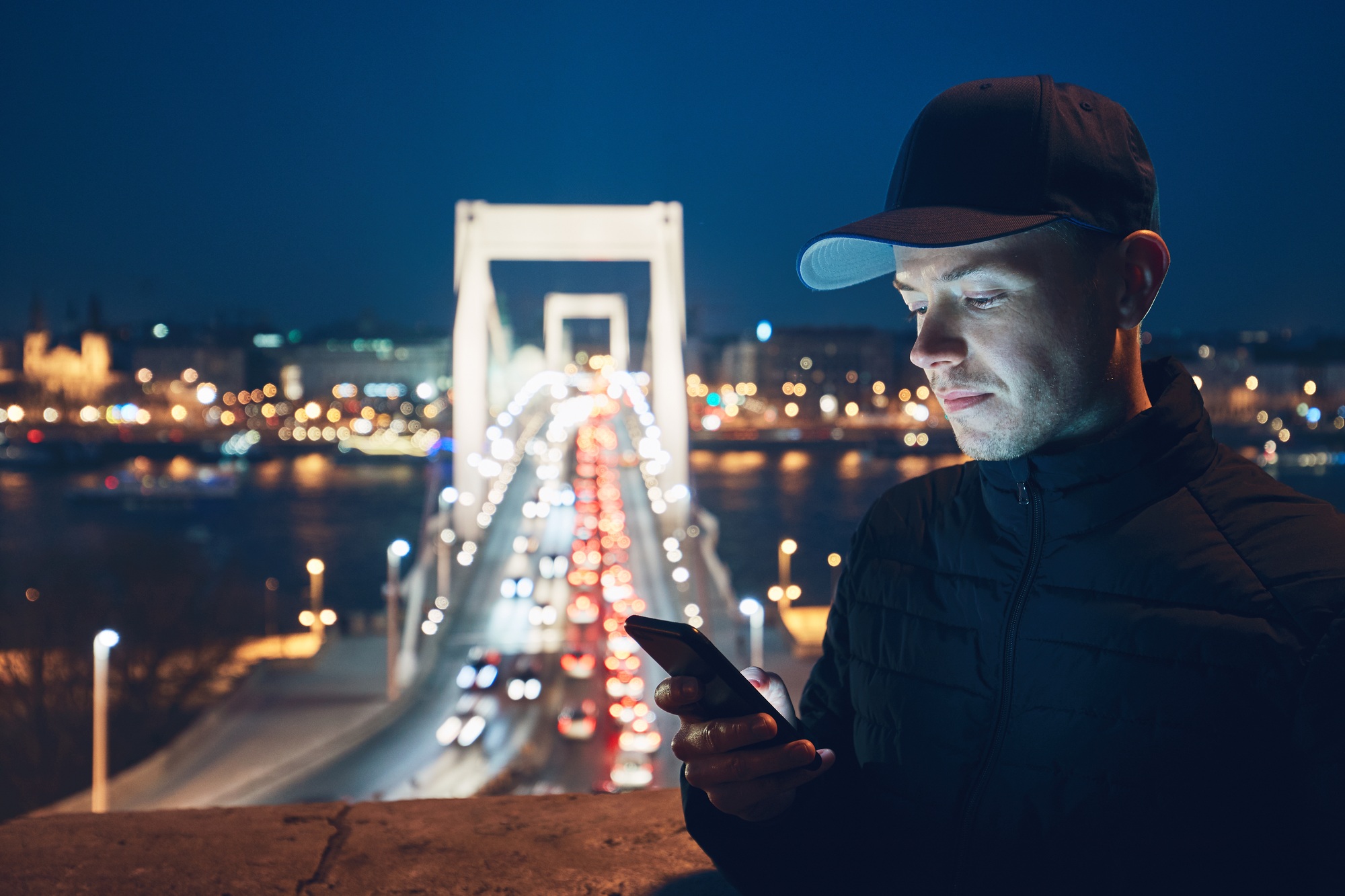 Young man reading text message