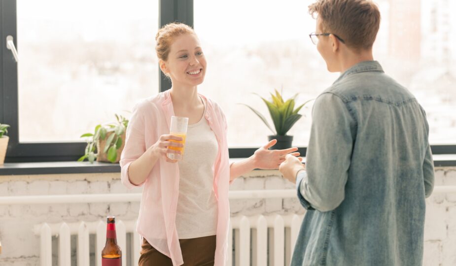 Couple talking at aprty
